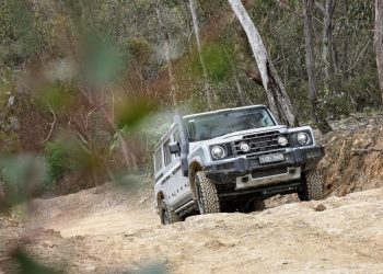 Ineos Grenadier traversing a tricky muddy hill