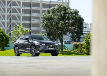 Lexus RZ 450e Dynamic in silver, parked in Auckland CBD