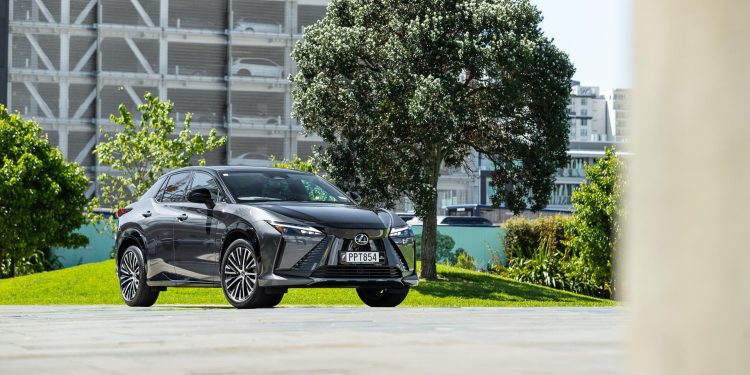 Lexus RZ 450e Dynamic in silver, parked in Auckland CBD