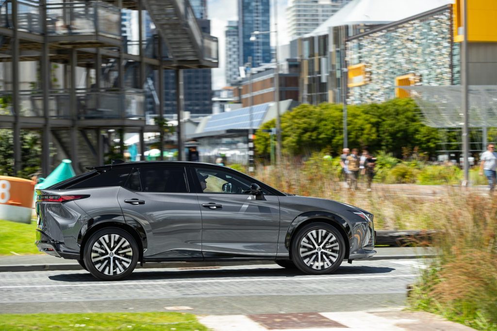 Lexus RZ 450e Dynamic side profile panning shot in Silo park