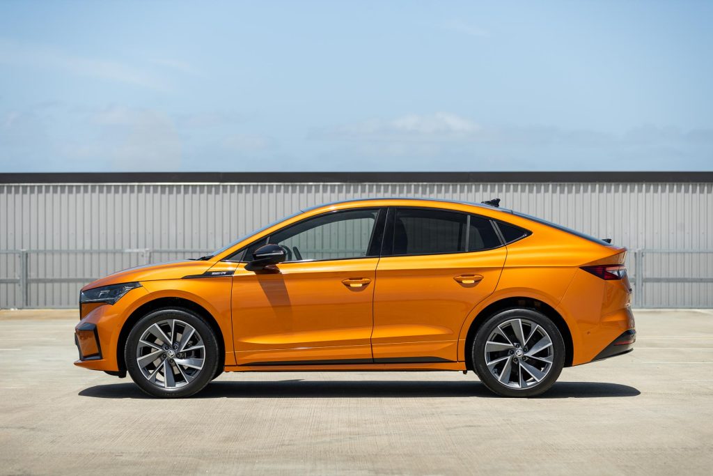 Side profile of 2023 Skoda Enyaq coupe in orange
