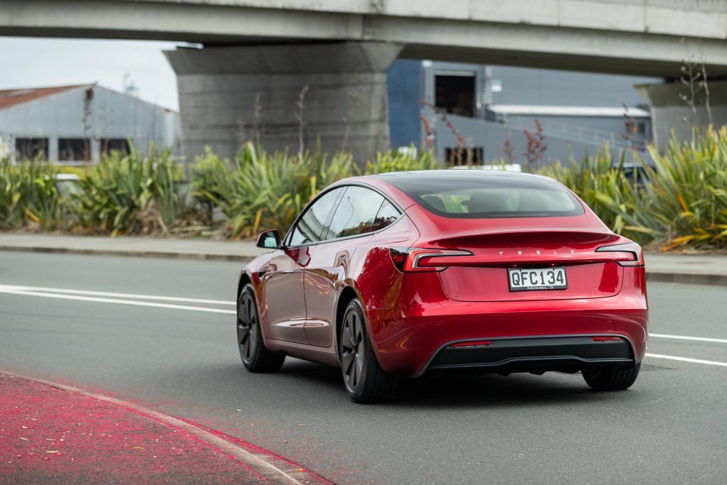 Rear action shot of the Tesla Model 3 RWD facelift