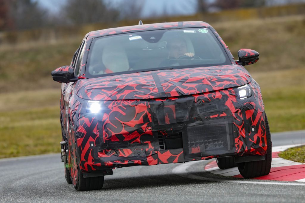 Camouflaged Alfa Romeo Milano driving around corner