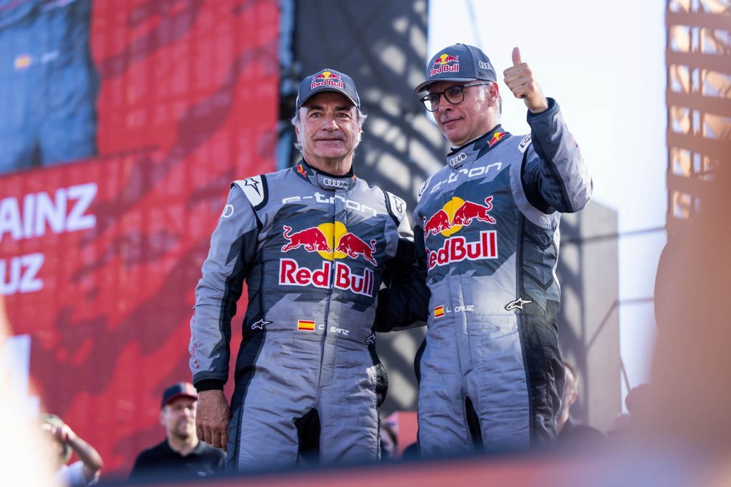 Carlos Sainz Sr and Lucas Cruz celebrating Dakar 2024 win