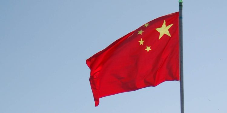 Chinese flag blowing in the wind