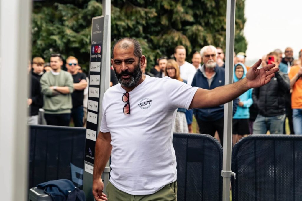 Chris Harris presenting in front of crowd at Collecting Cars Coffee Run in UK