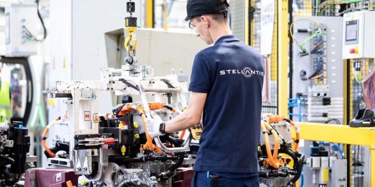 Man working on electric motor