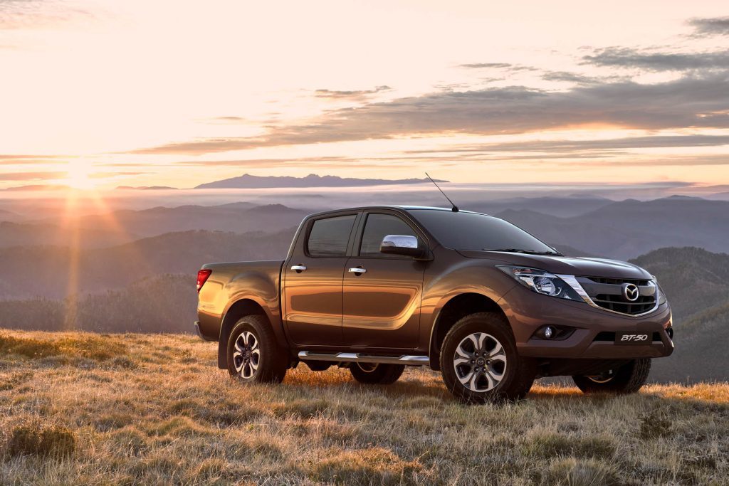 2015 Mazda BT-50 parked in field on hill