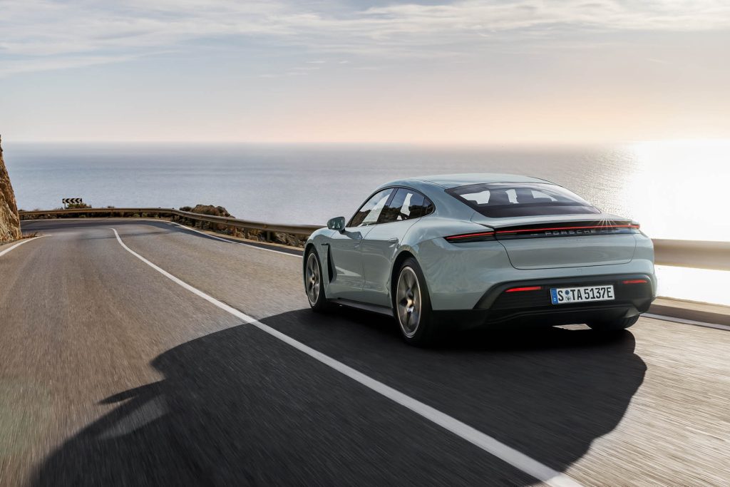 Updated 2024 Porsche Taycan driving on road