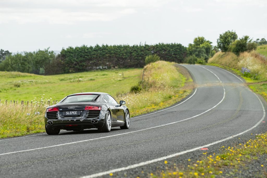 Audi R8 rear end, driving on a New Zealand road