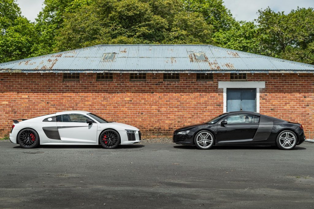 Audi R8 Type 4S in white, next to Audi R8 Type 42 in black, side by side comparison