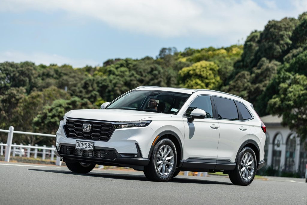 White Honda CR-V sport, taking a corner in Mission Bay