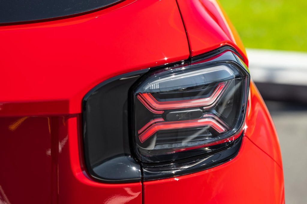 X shaped tail lights with Jeep grille motif