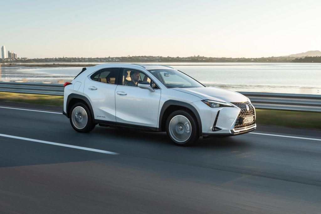 Lexus UX300e Limited in white, driving on the Auckland motorway