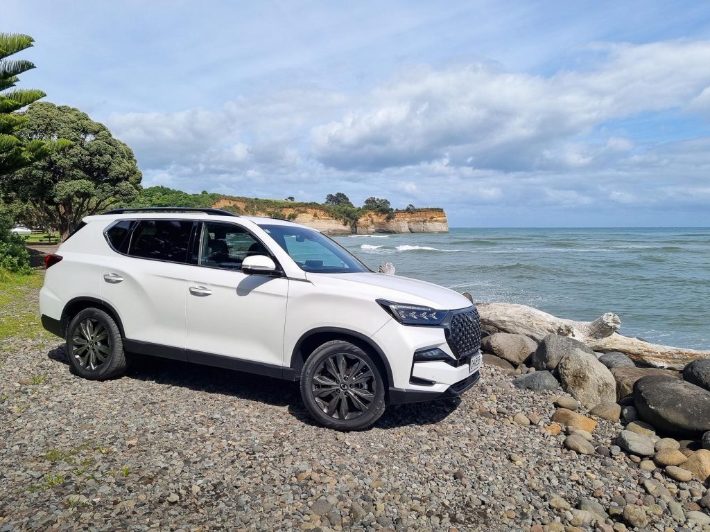 SsangYong Rexton SPR in white, parked at the beach
