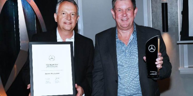 Trevor Walmsley, Dealer Principal for Mercedes-Benz Auckland accepting award from from Joerg Schmidt, General Manager for Mercedes-Benz New Zealand – Cars.