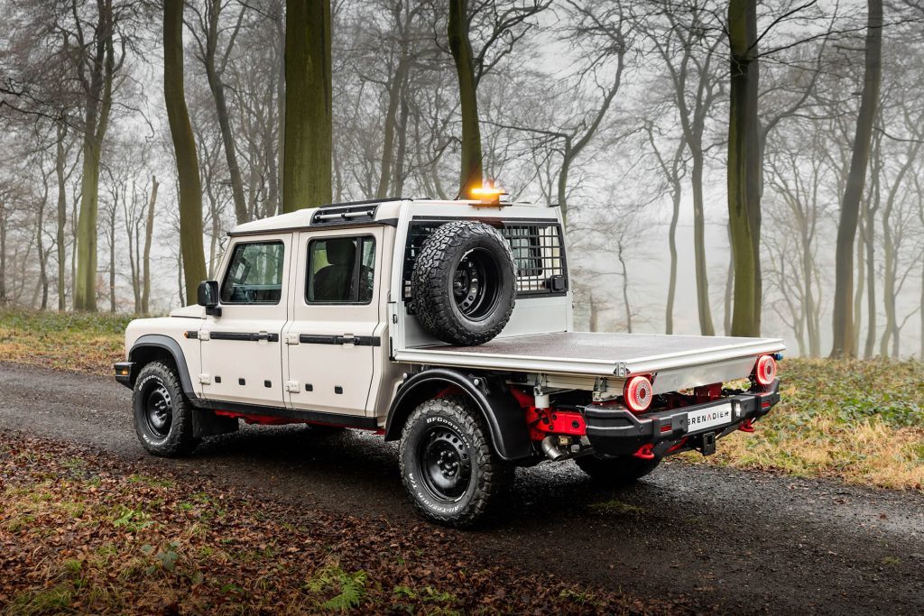 2024 Ineos Grenadier Quartermaster Chassis Cab with flat deck rear three quarter view