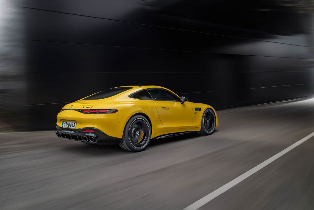 2024 Mercedes-AMG GT43 driving rear three quarter view