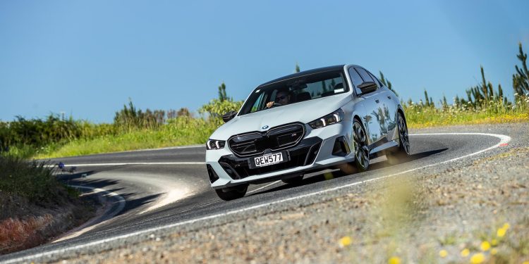 BMW i5 M60 taking a corner at pace