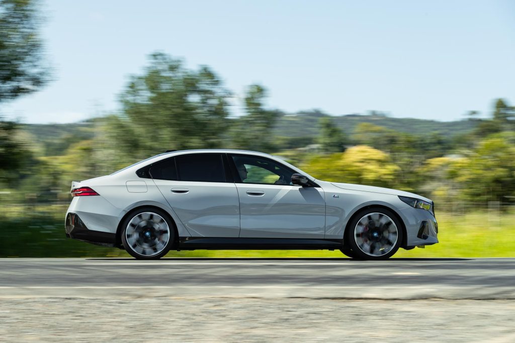 side panning shot of the BMW i5 M60