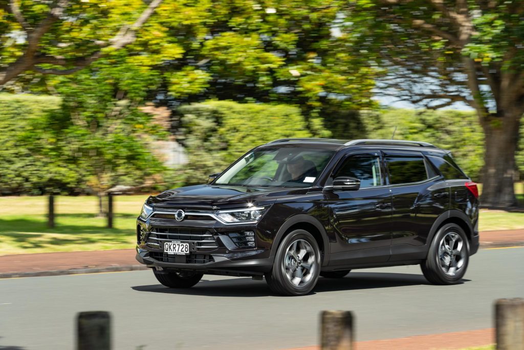 Front panning shot of the SsangYong Korando Limited, driving in Auckland