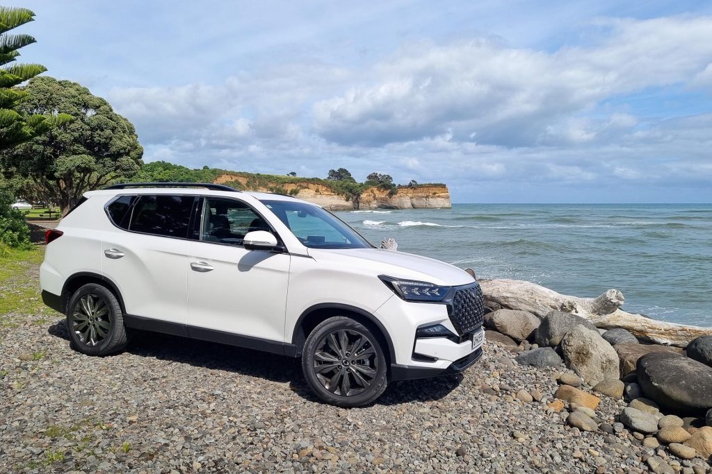 SsangYong Rexton in white, front quarter shot by the beach