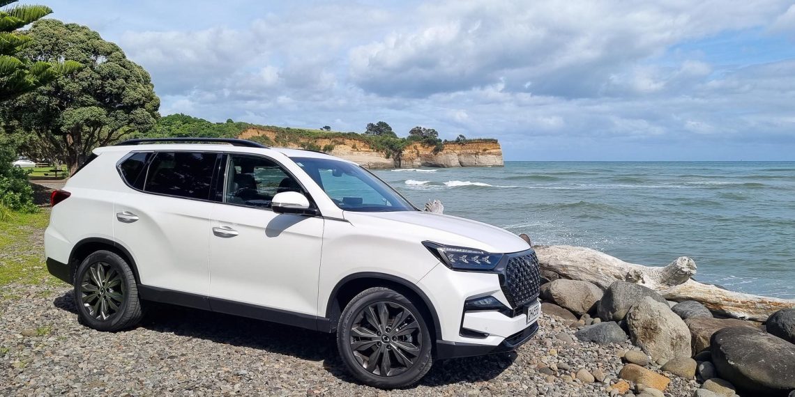 SsangYong Rexton in white, front quarter shot by the beach