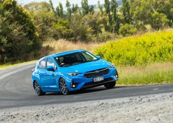 Front cornering shot of the 2024 Subaru Impreza, in blue