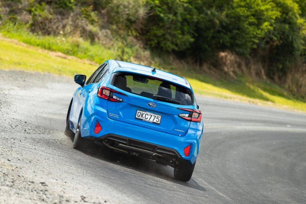 2024 Subaru Impreza cornering shot, shown from rear