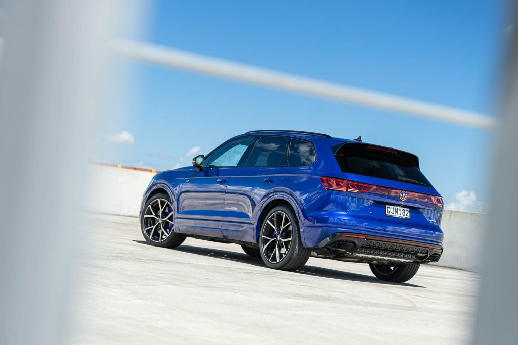 VW Touareg R in blue, parked on a rooftop