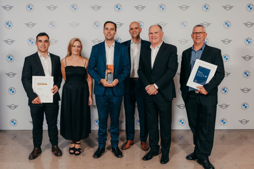 BMW Coombes Johnston team celebrating Dealer of the Year award for 2023