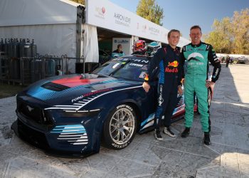 Liam Lawson and James Courtney standing next to Gen3 Ford Mustang Supercar