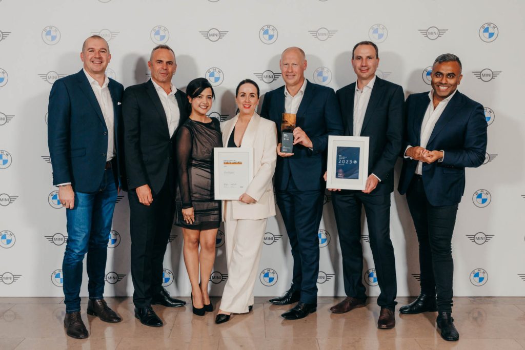 Christchurch Mini Garage celebrating Dealer of the Year award for 2023