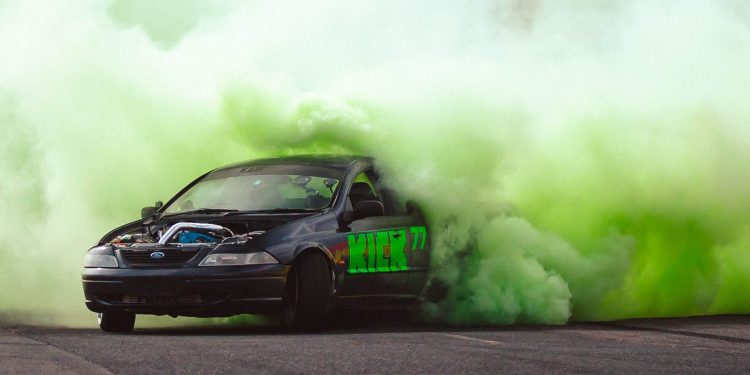 Valtteri Bottas doing a burnout in Ford Falcon (AU) ute