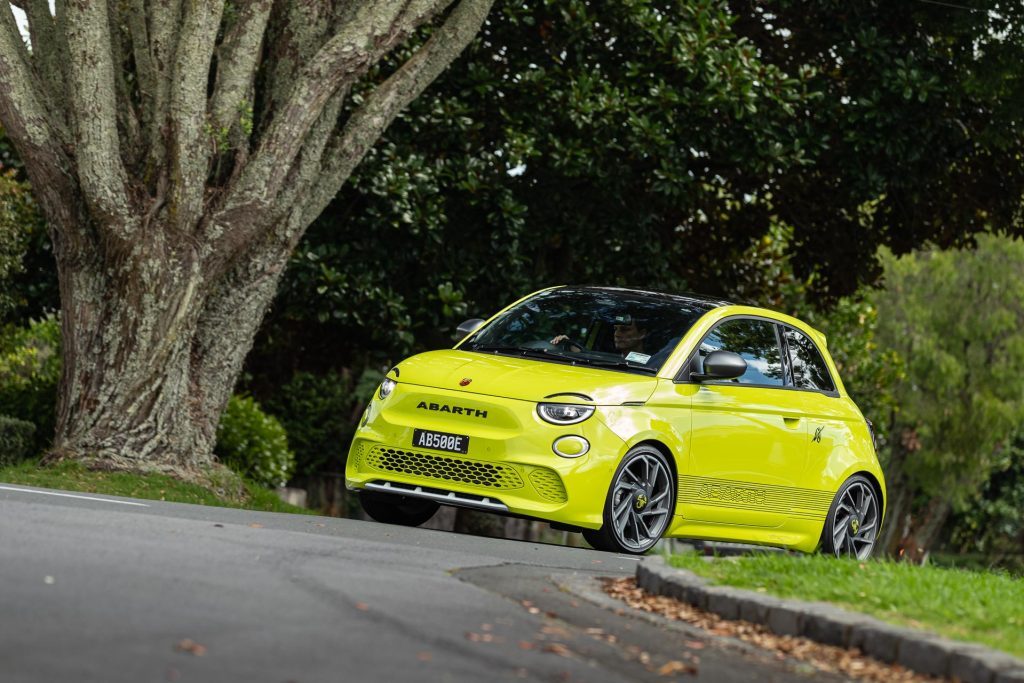 Abarth 500e Scorpionissima taking a corner at pace