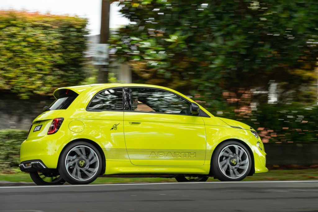 Motion blurred panning shot of the Abarth 500e Scorpionissima on the move