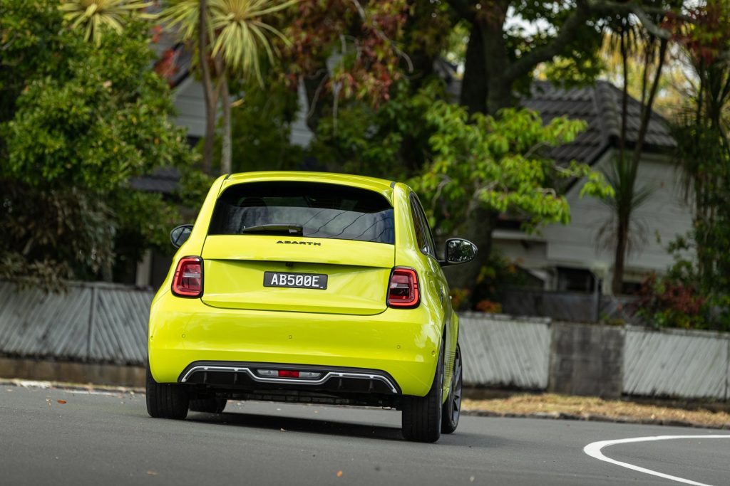 Cornering view of the Abarth 500e Scorpionissima, showing little body roll