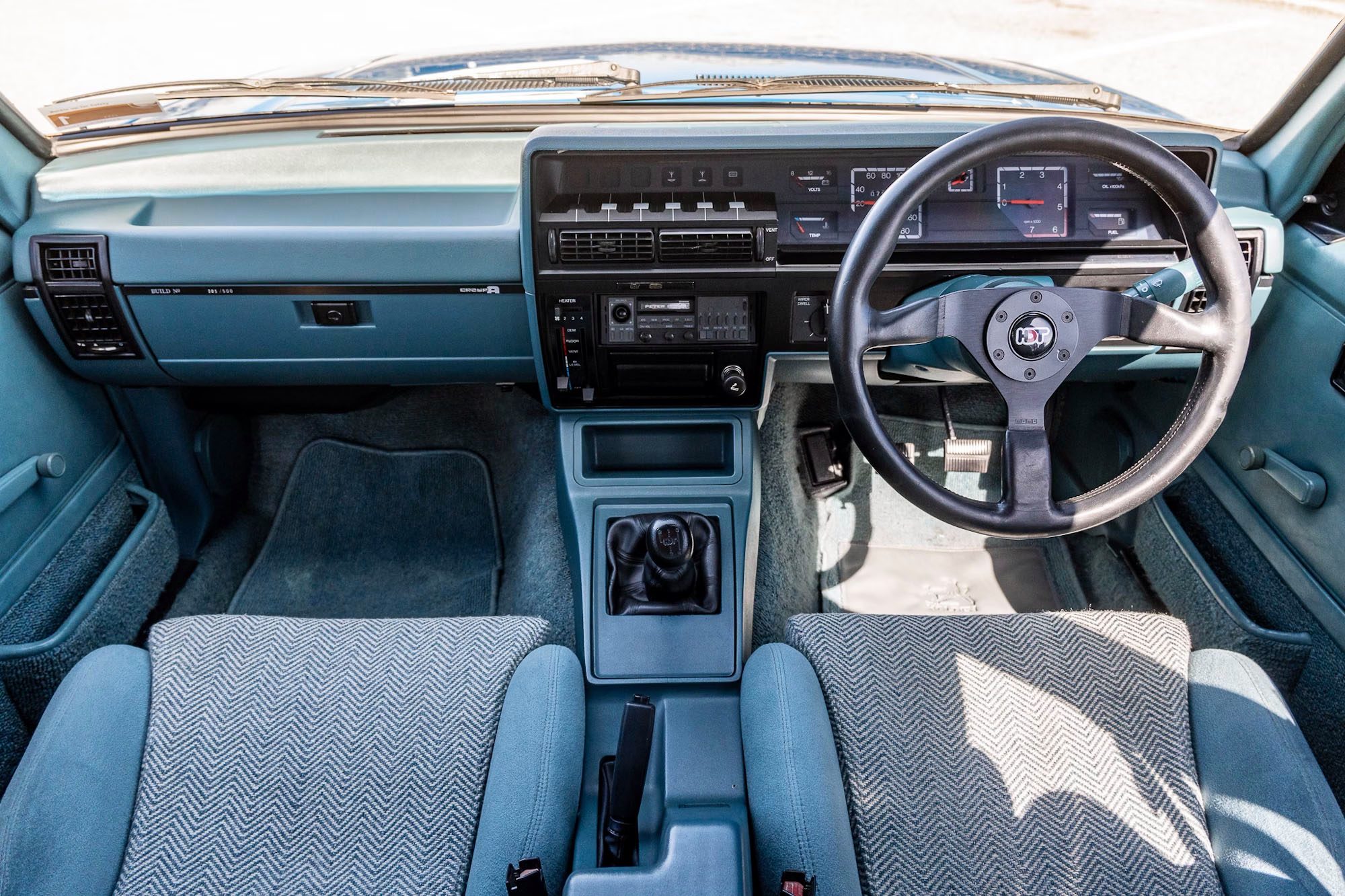 Interior with Momo wheel and velour upholstery.