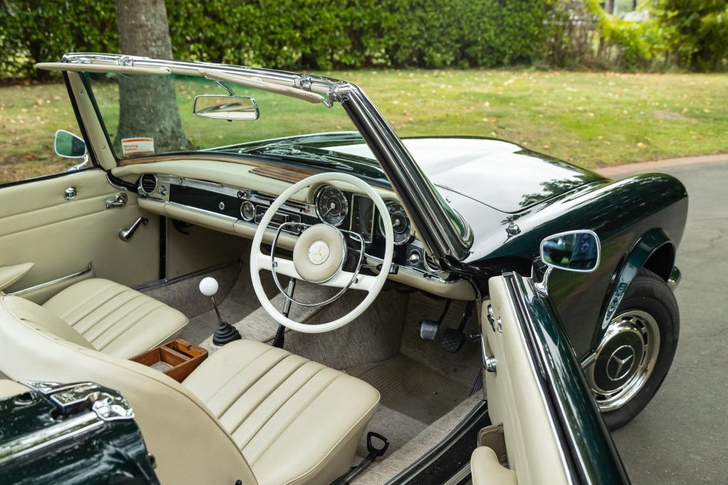 Wide interior shot with door open in the Mercedes-Benz 230 SL Pagoda