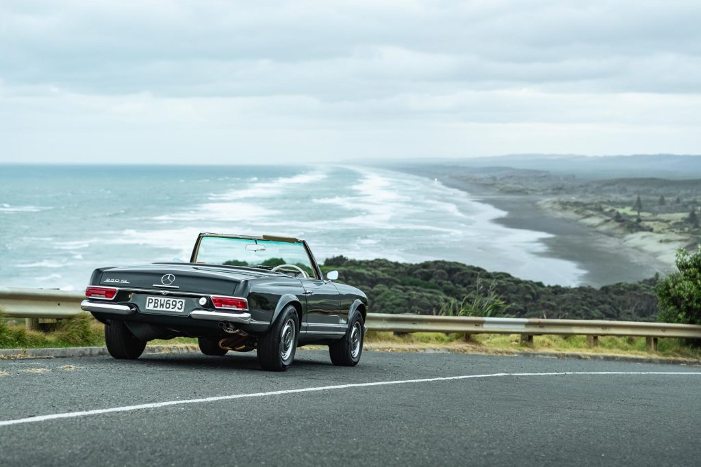 Mercedes-Benz 230 SL Pagoda scenic shot, at Muriwai beach