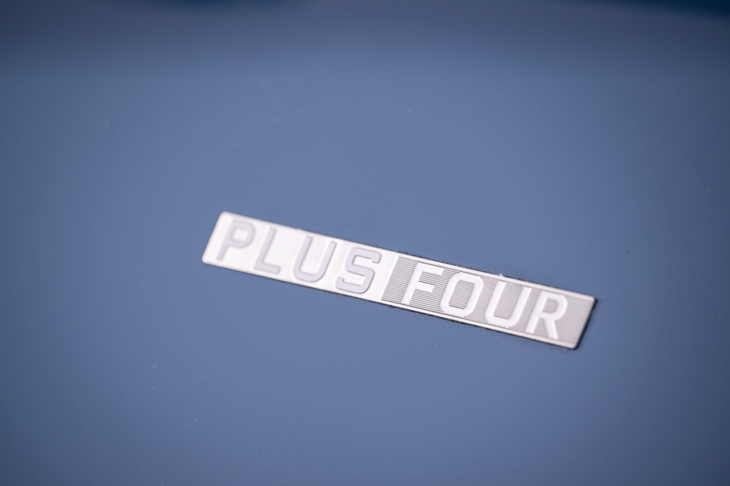 The Plus Four badging.