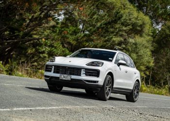 Porsche Cayenne e-Hybrid cornering at pace, shown from front