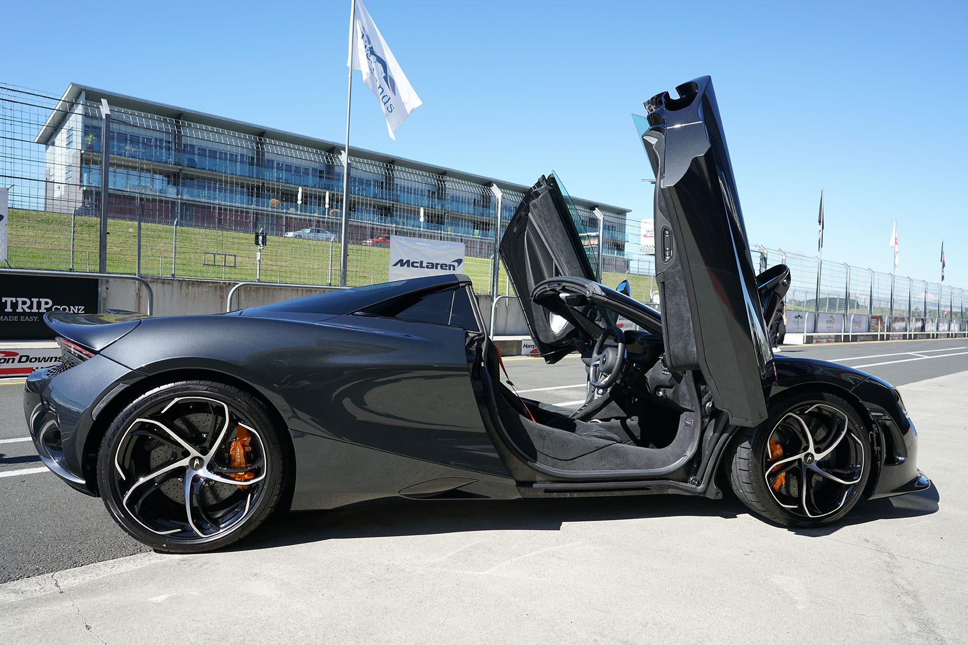 Dihedral doors of the 750S Spider, at the track for display purposes only.