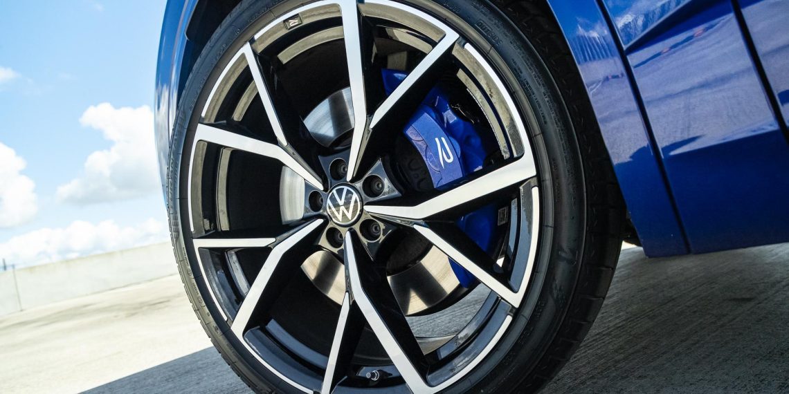 VW wheel under a blue sky