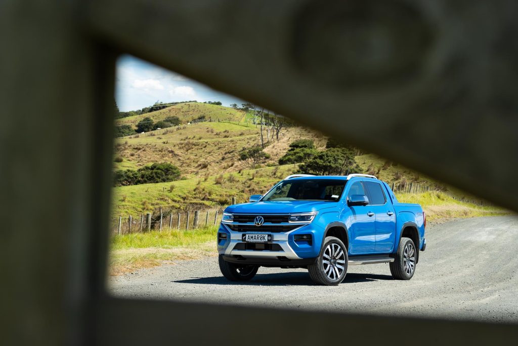 2024 Volkswagen Amarok Aventura framed through a farm gate