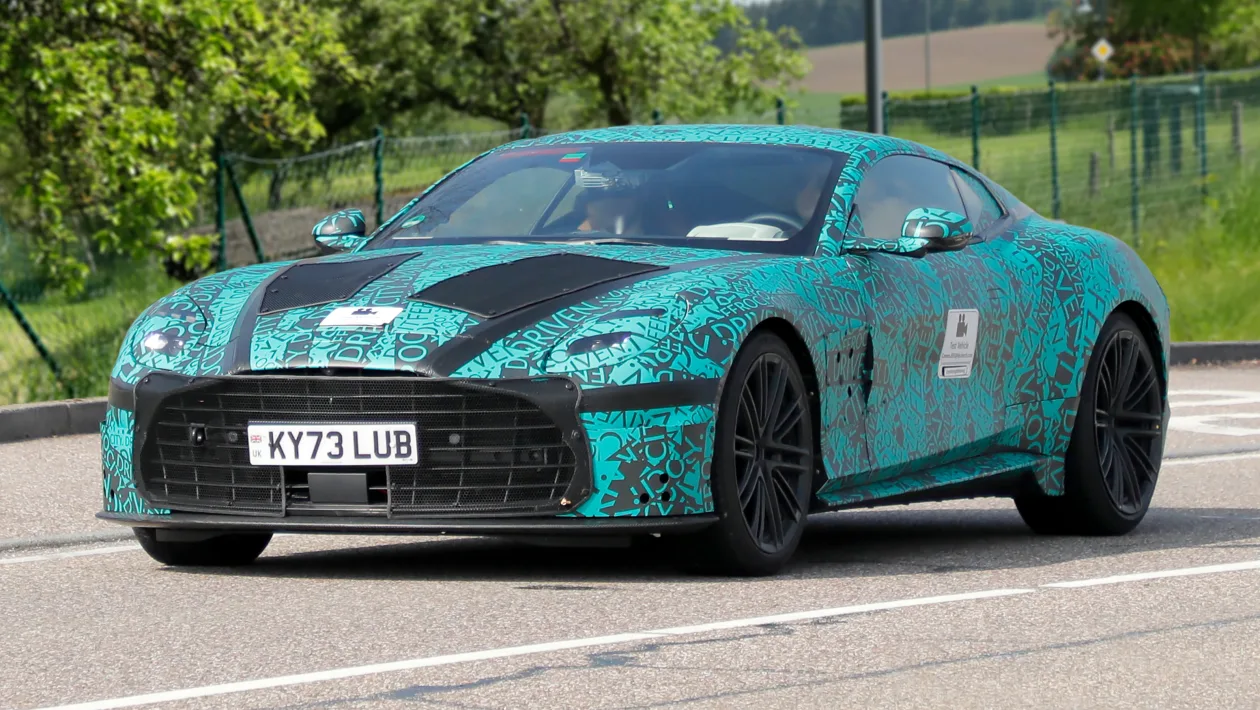 Aston test vehicle on road during proving tests.