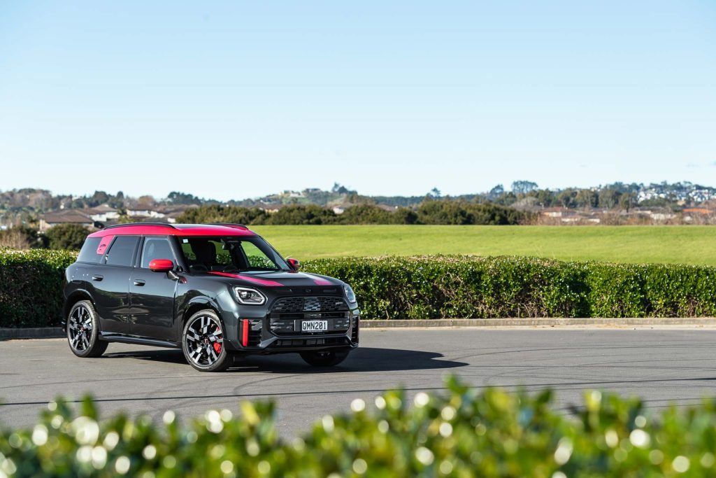 Mini Countryman JCW All4 Flavoured model in black and red. Parked in a park
