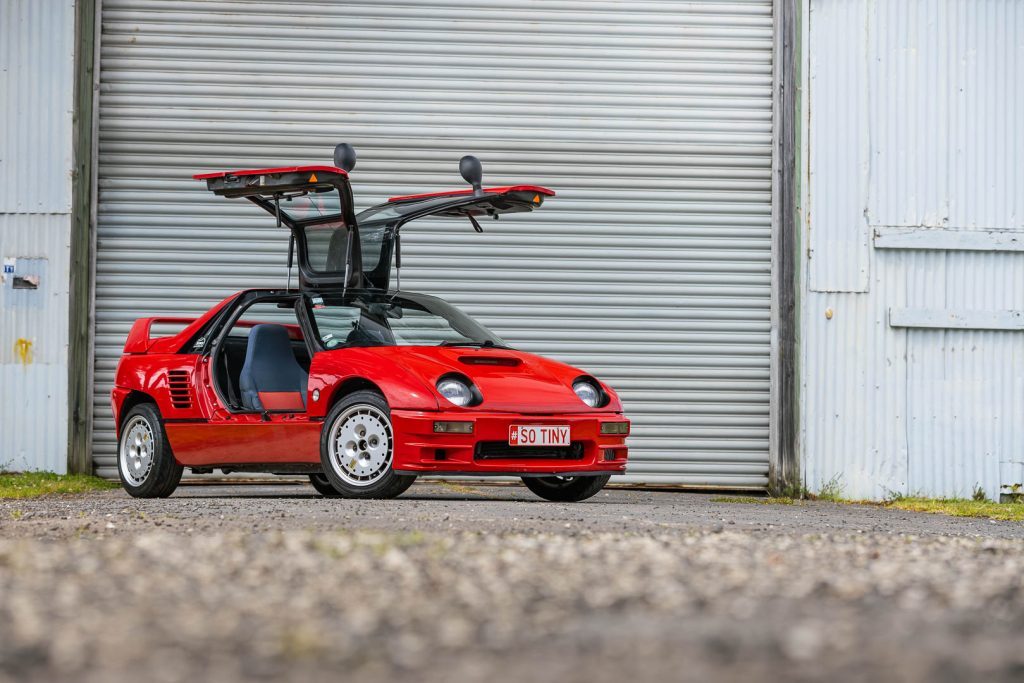 Autozam AZ-1 Mazdaspeed with gullwing doors open, in red