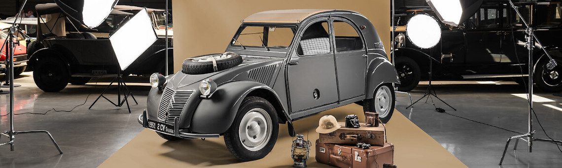 A 2CV about to go on safari, by the looks of it.
