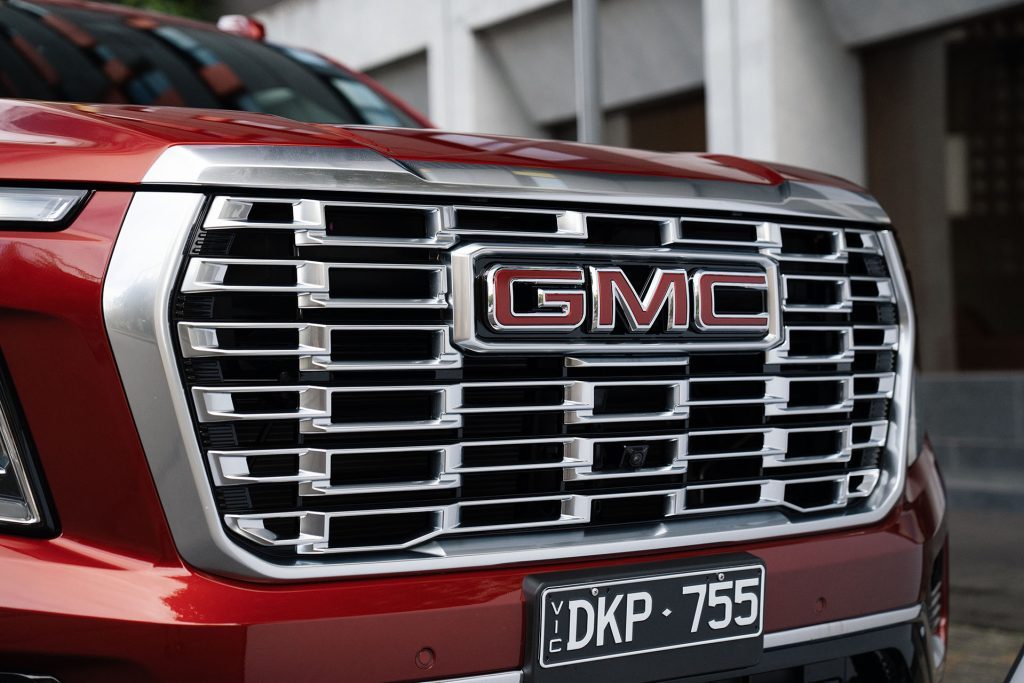 The GMC badge lights up at night.